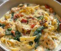 Creamy Lemon Parmesan Chicken Pasta: One-Pot Recipe with Sun-Dried Tomatoes & Spinach